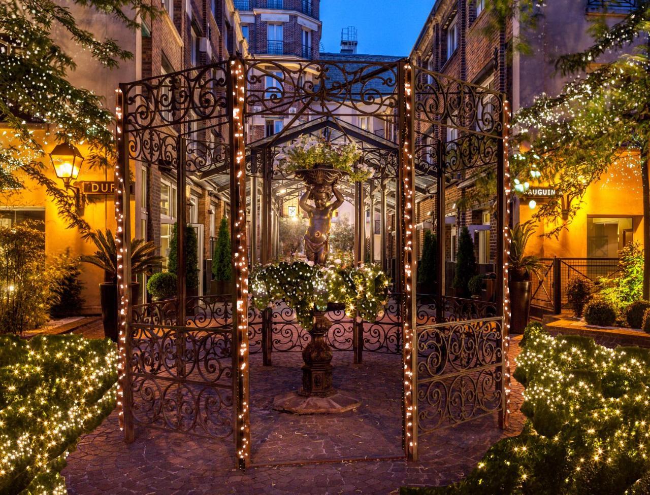 Les Jardins Du Marais Hotel Paris Exterior photo